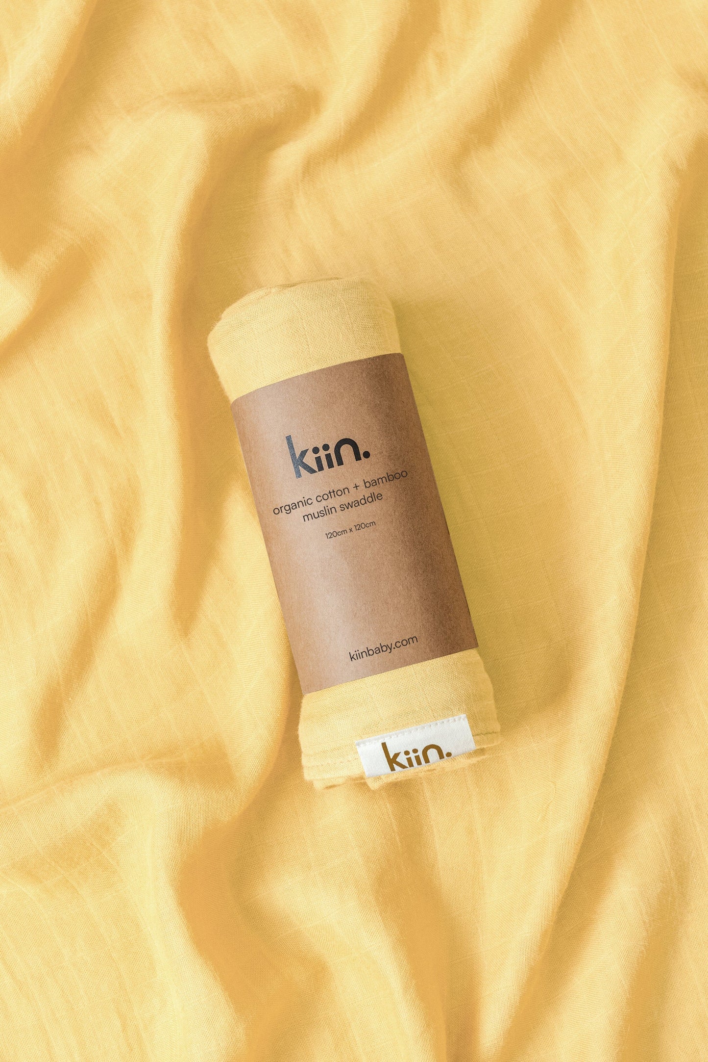 Organic muslin baby swaddle in buttercup yellow
soft newborn essential and baby shower gift.
Breathable organic cotton bamboo swaddle for hospital bags and newborn sleep.