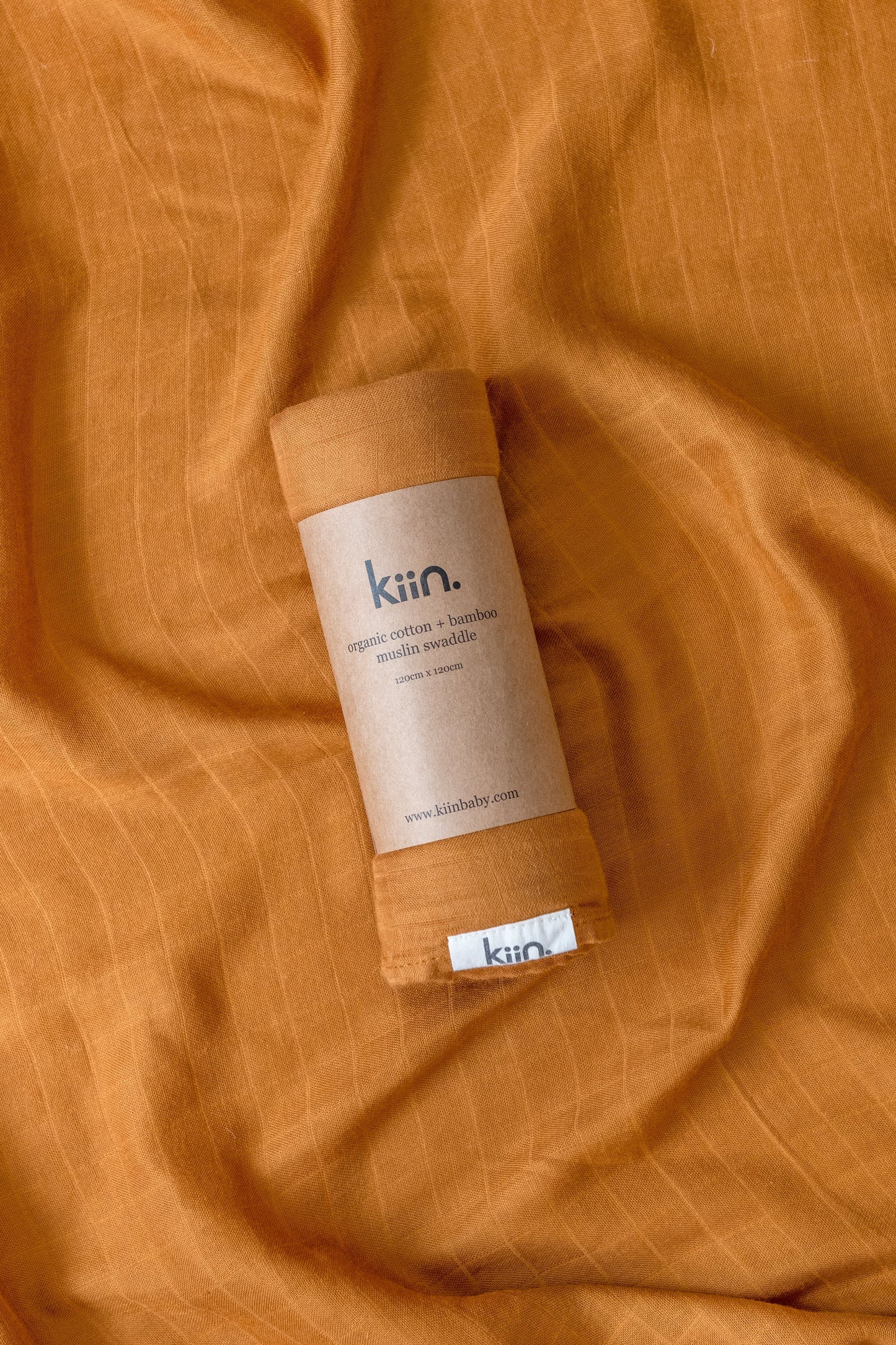 Organic muslin baby swaddle in caramel
soft newborn essential and baby shower gift.
Breathable organic cotton bamboo swaddle for hospital bags and newborn sleep.